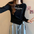 Damen Langarmshirt mit kreativem Druck und lässigem Schnitt