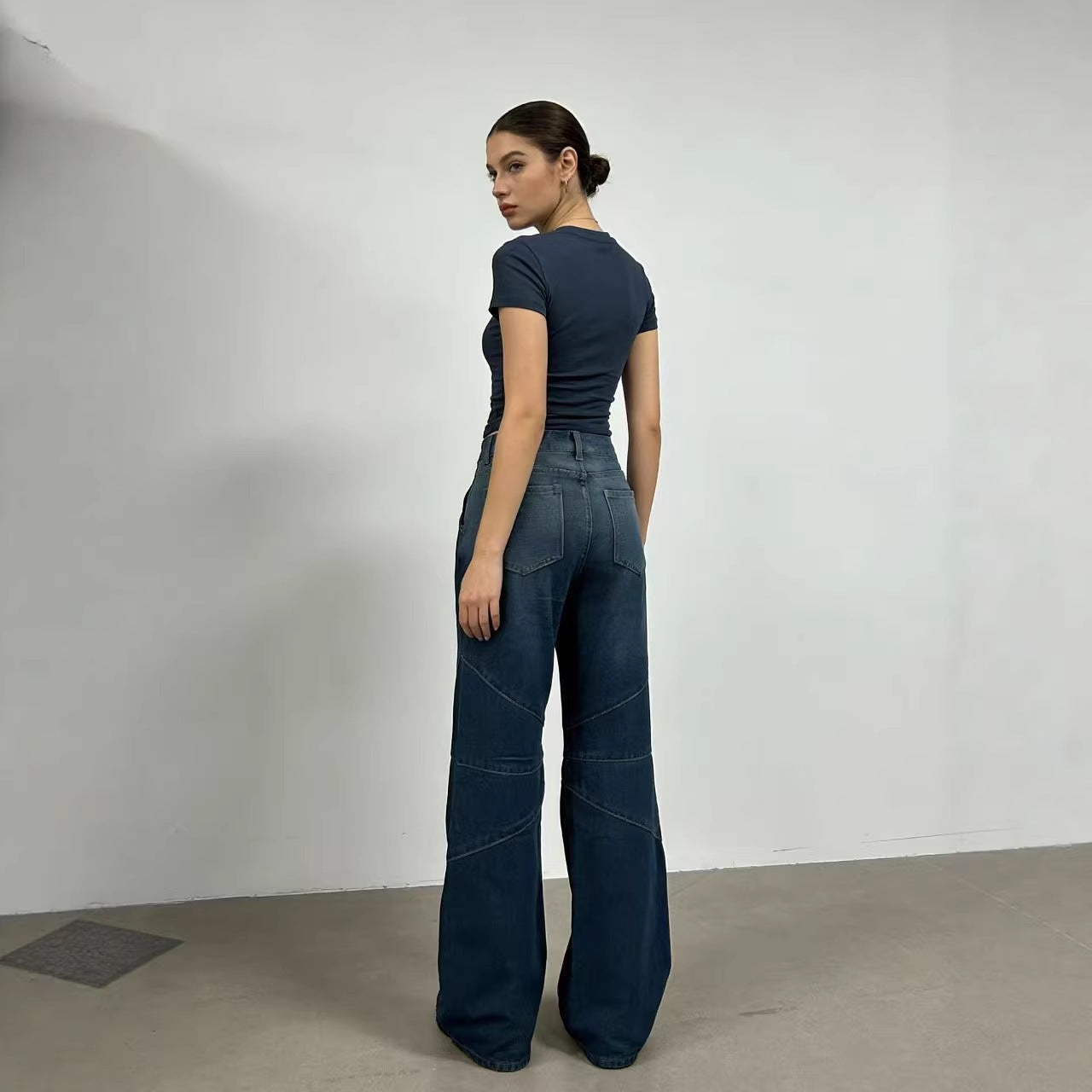 Damen Weite Denim-Hose mit asymmetrischen Nähten