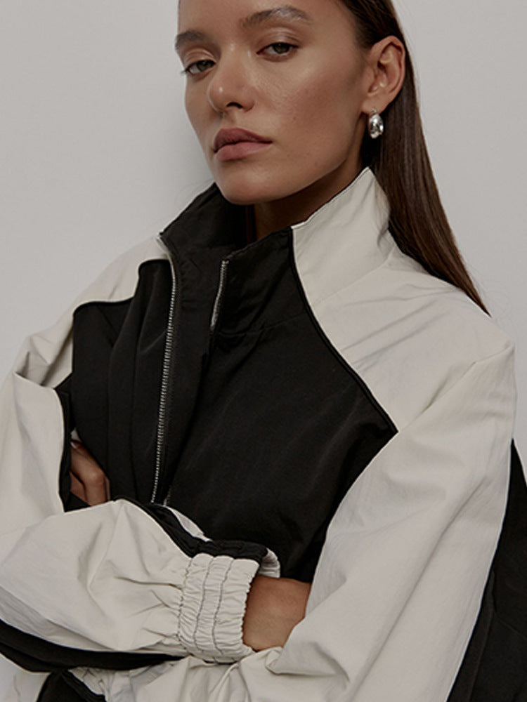 Damen Sportjacke mit hoch stehendem Kragen und kontrastierenden Ärmeln R&B