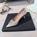 Damen elegante spitze Pumps mit strassverzierter Schleife