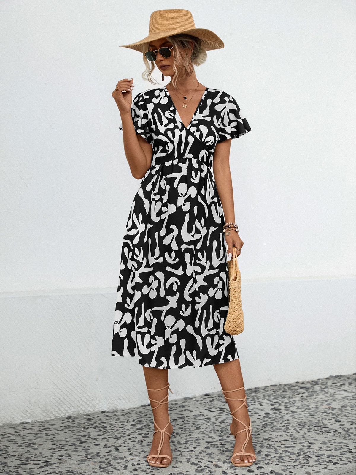 Damen Midi-Kleid mit V-Ausschnitt und fließenden Rüschendetails
