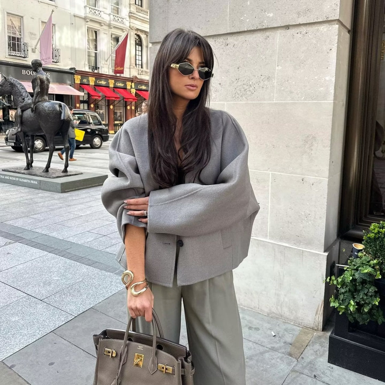Damen elegante Jacke mit strukturiertem Stoff und großzügigen Taschen
