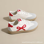 Damen Sneakers im sportlichen und eleganten Design mit rosa Akzenten R&B