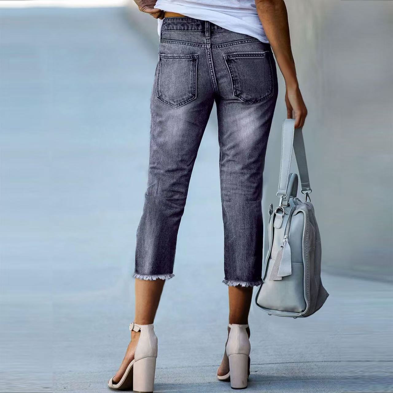 Damen 3/4 Jeans mit modischem Fransenabschluss