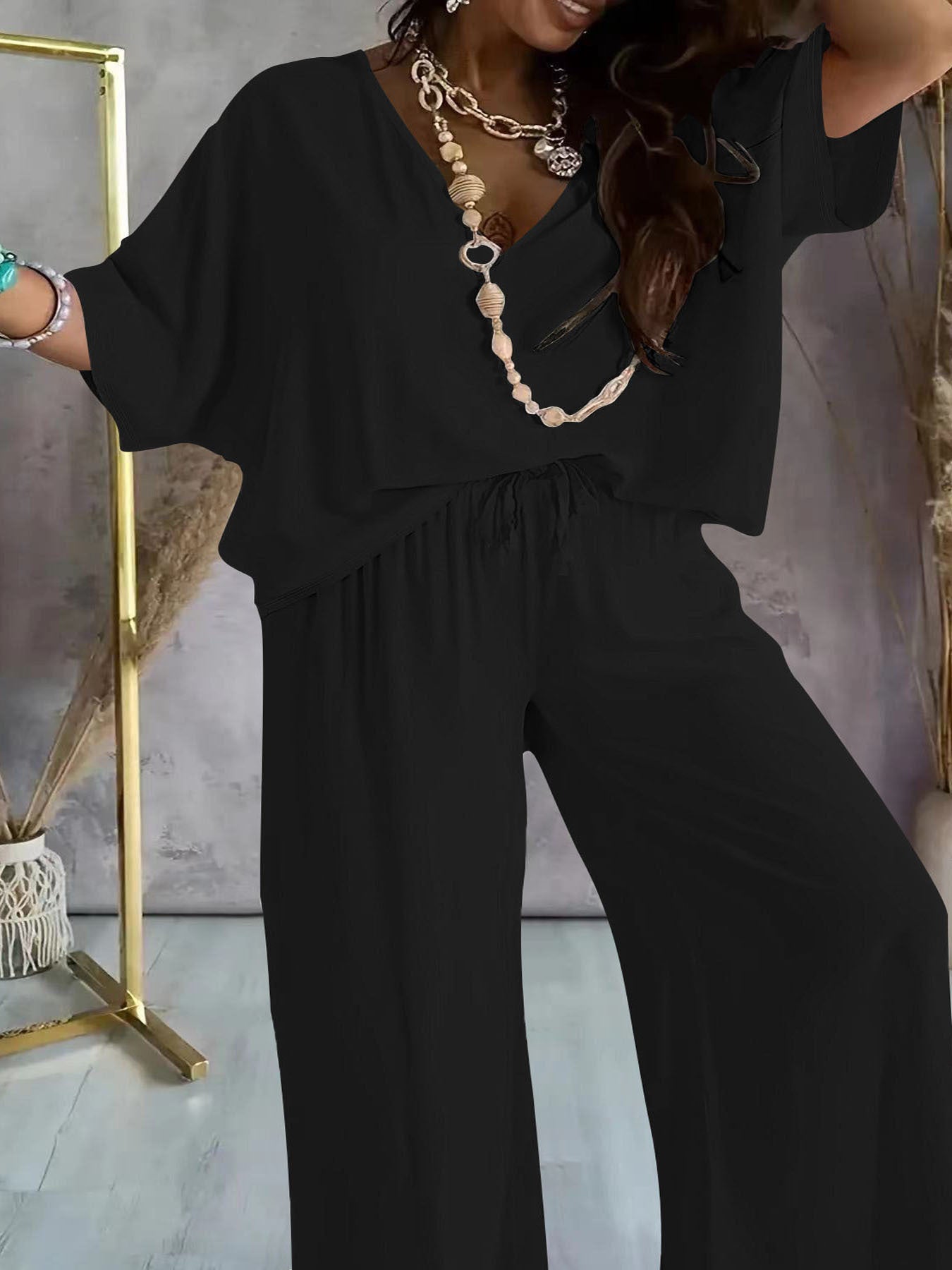 Damen Jumpsuit mit lässigem V-Ausschnitt und weitem Bein R&B