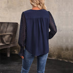Damen Bluse mit transparenten Puffärmeln und V-Ausschnitt