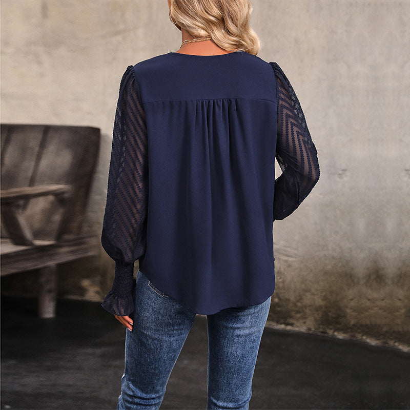 Damen Bluse mit transparenten Puffärmeln und V-Ausschnitt