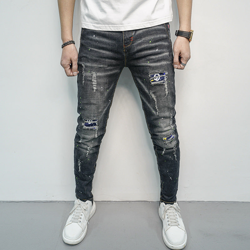 Herren Skinny Fit Jeans im kreativen Rissdesign und bunten Farbsklecks R&B