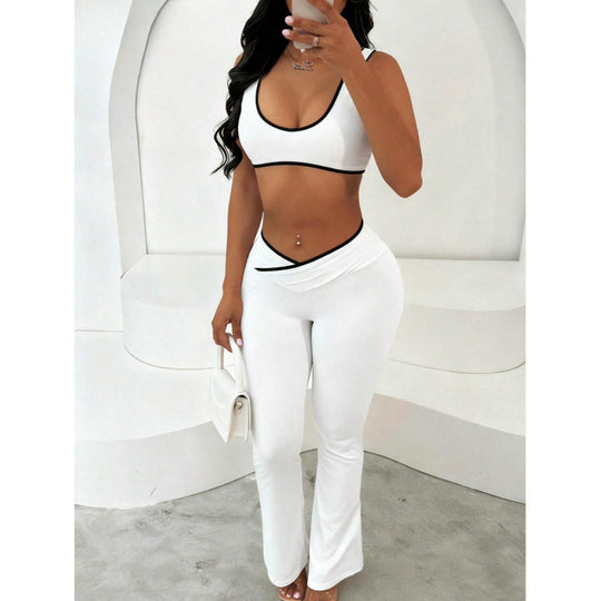 Damen Sportliches Zweiteiler Set mit kurzer Oberteil und flared Leggings R&B