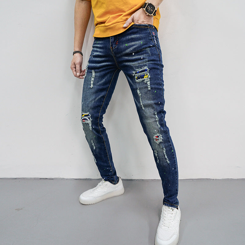 Herren Skinny Fit Jeans mit kreativen Farbklecksen und Rissdesign R&B