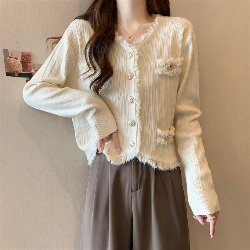 Damen gemütliche Strickjacke mit dezenten Fransen und modischen Knöpfen