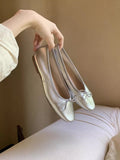 Damen Elegante Ballerinas mit schimmerndem Metallic-Finish und zierlichem Schleifenakzent