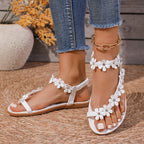 Damen Zehenstegsandalen mit floralen Applikationen und rutschfester Sohle R&B