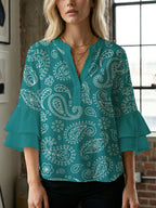 Damen Bluse mit voluminösen Flügelärmel und intensivem Blattmuster