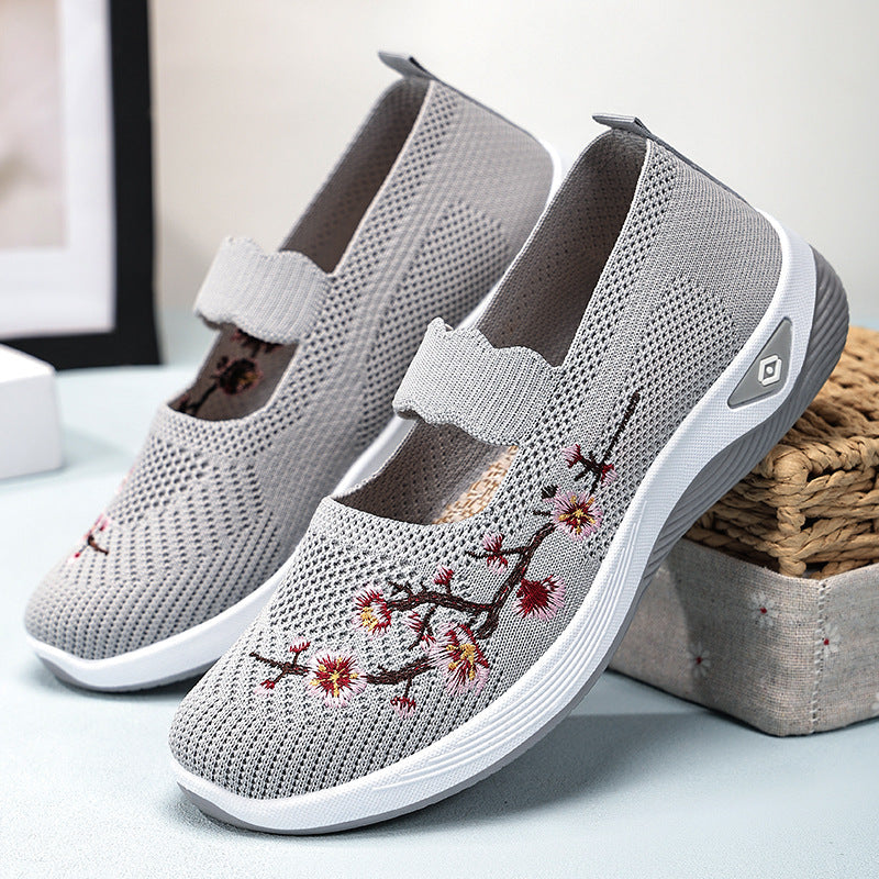 Damen Sportliche Slip-On Sneakers mit floralem Stickdesign
