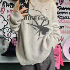 Damen Oversized Strickpullover mit auffälligem Spinnenmuster R&B
