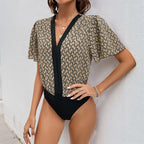 Damen modische Bluse mit V-Ausschnitt und feinem Muster