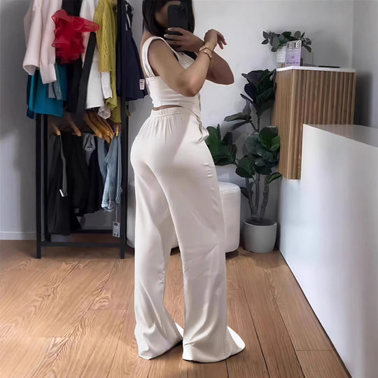 Damen Jumpsuit mit figurbetontem Oberteil und weiten Beinen R&B