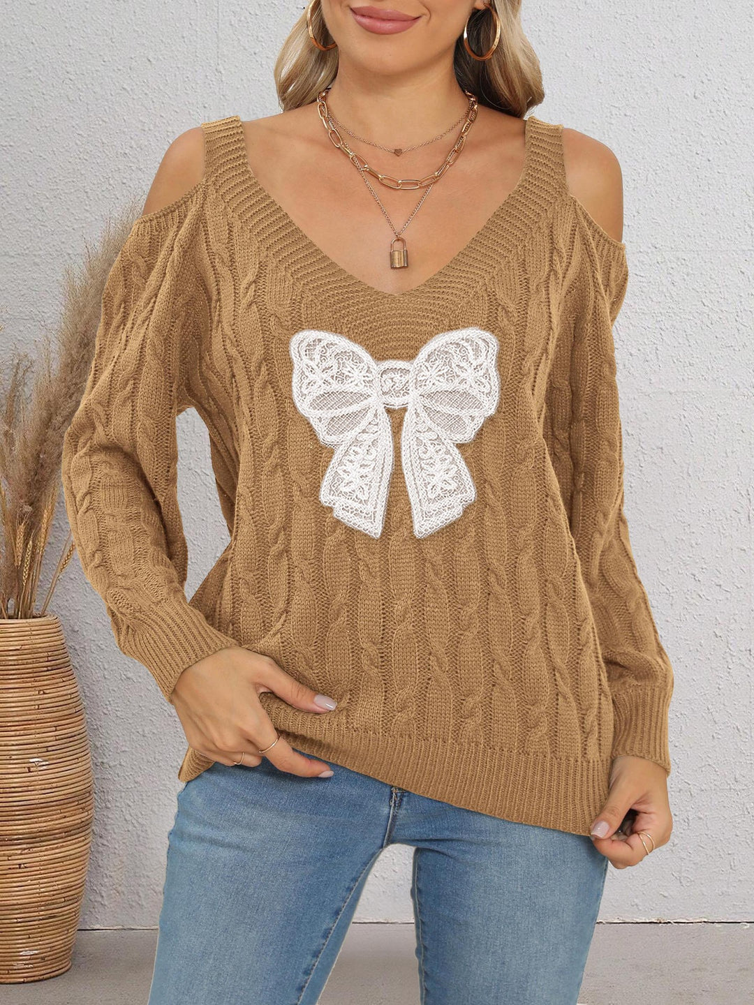 Damen modischer Pullover mit verspielt eingestricktem Schleifenmotiv R&B