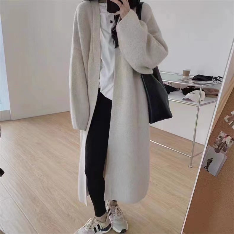 Damen Langer Wollmantel im minimalistischen Stil mit weitem Schnitt und eleganten Details R&B