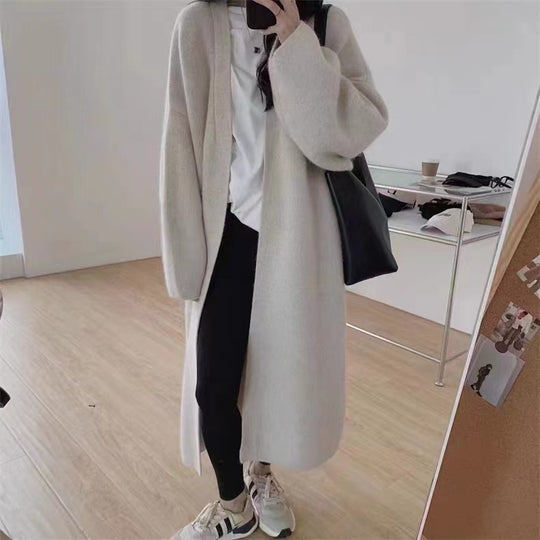 Damen Langer Wollmantel im minimalistischen Stil mit weitem Schnitt und eleganten Details R&B