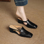 Damen Komfortable Mules mit elegantem Blickfang