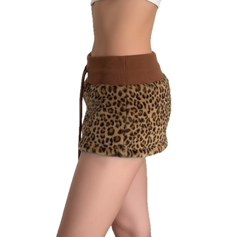 Damen eleganter Minirock aus fellartigem Material mit Modellknopf und Taillenband R&B