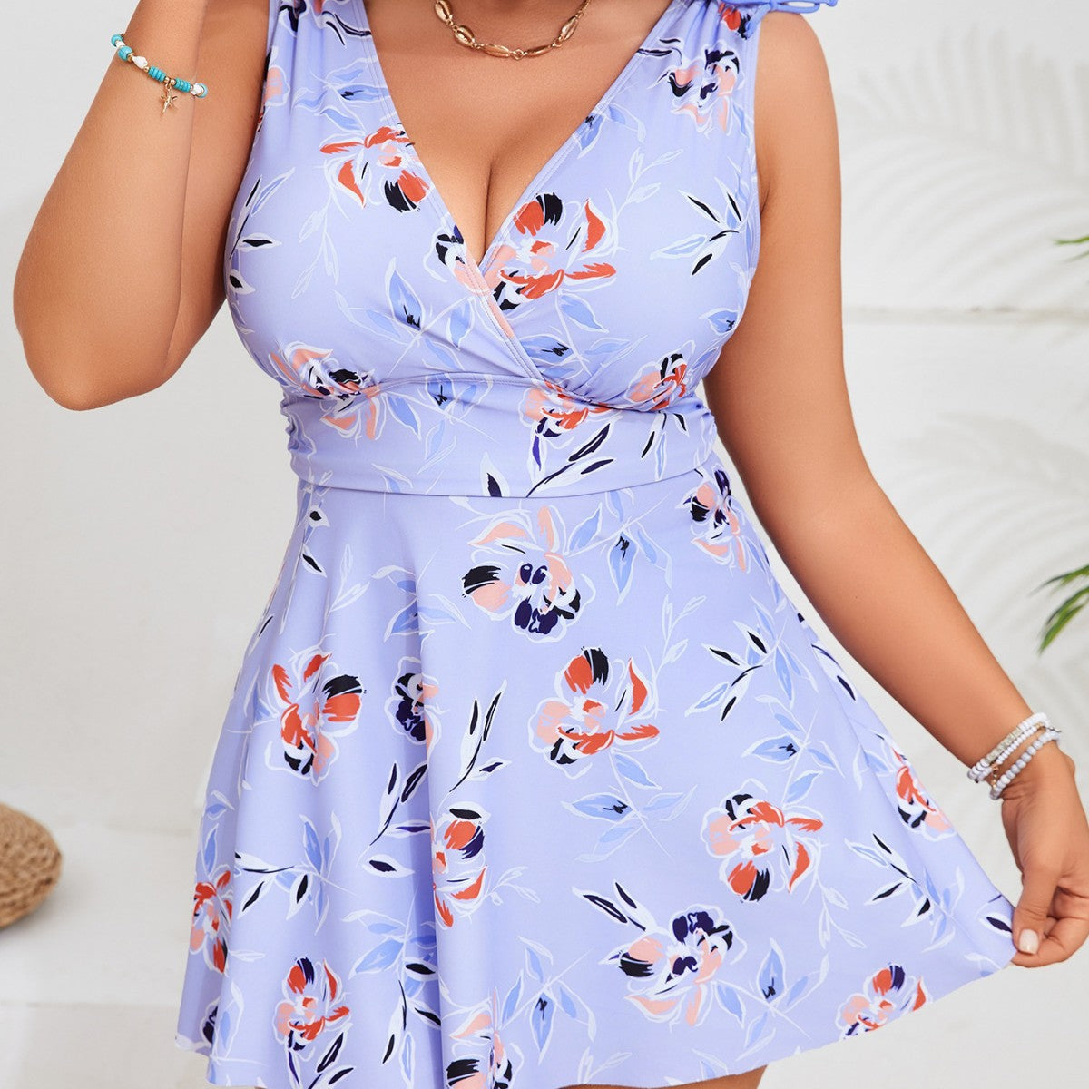 Damen Badeanzug mit floralem Schnitt und praktischen Taschen R&B