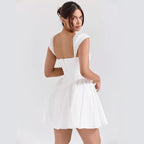 Damen verspielt geschnittenes Cortikleid mit voluminösen Puffärmeln