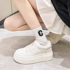 Damen Sneaker mit hohem Plateau und sportlichem Design