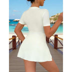Damen elegantes Strandkleid mit dekorativem Blumenakzent