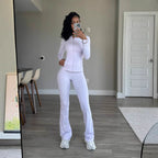 Damen Sportliches Fitness-Outfit mit enganliegendem Langarm-Oberteil und weiten Sporthosen R&B