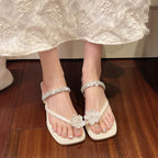Damen elegante Flip-Flops mit glitzerndem Riemen und floralem Detail EB