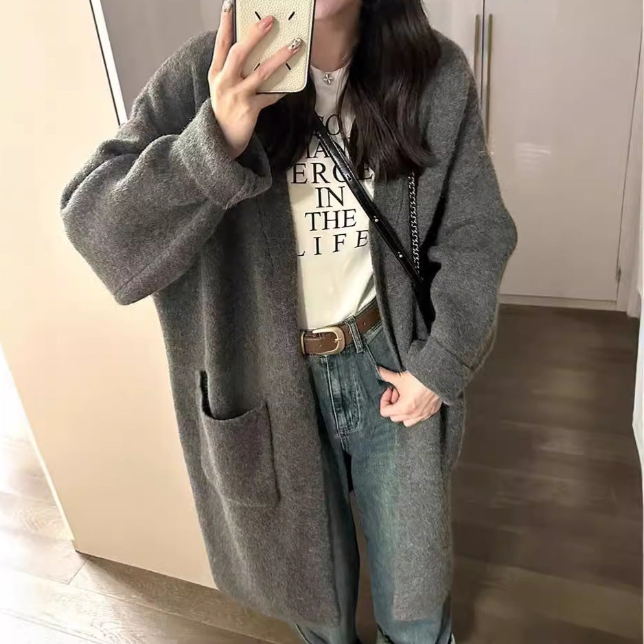 Damen Langer Oversized Strickcardigan mit praktischen Taschen und breiten Ärmeln