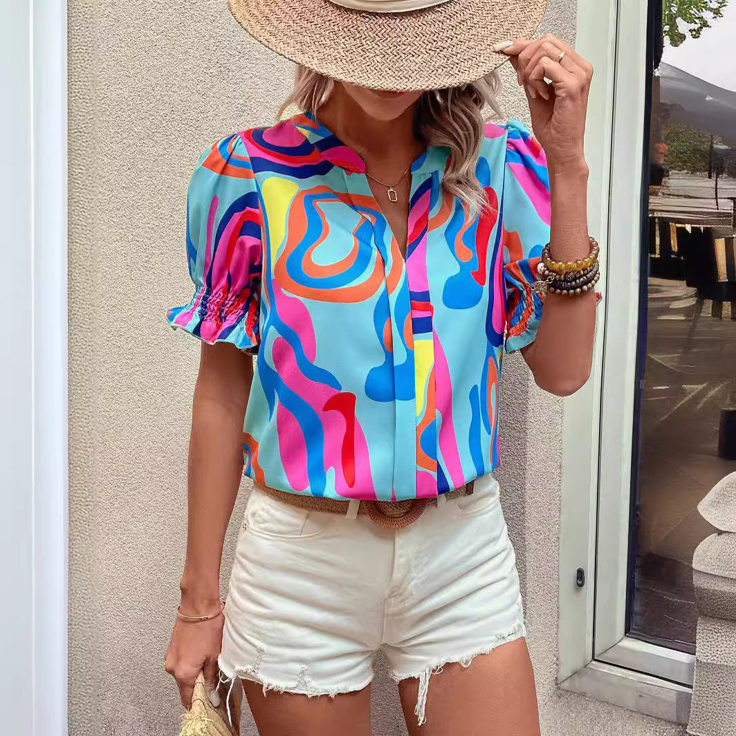 Damen Bluse mit kessen Puffärmeln und kreativem Grafikdesign R&B