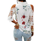 Damen Bluse mit Cut-Out-Ärmeln und floralem Design
