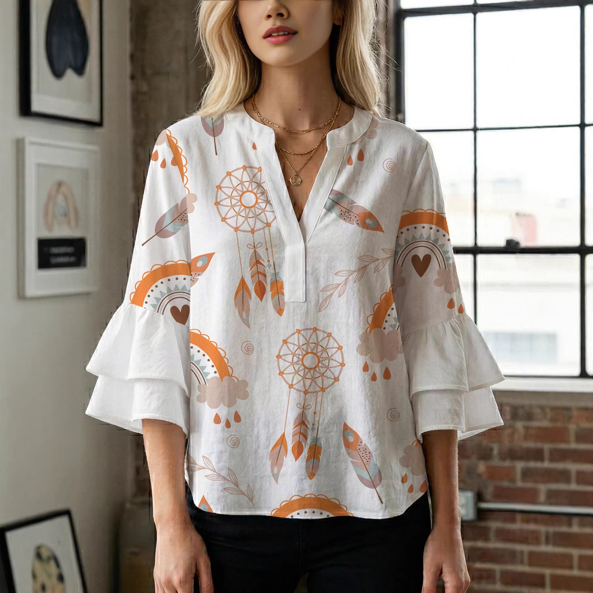 Damen Bluse mit voluminösen Flügelärmel und intensivem Blattmuster