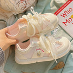 Damen Sneakers mit verspielten Rüschen und luftiger Mesh-Oberfläche