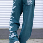 Herren nan weite Sweathose aus angerautem Fleece mit seitlichem Vintage-Print und Kordelbund R&B