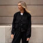 Damen lässige Kunstlederjacke mit praktischen Taschen und elastischen Bündchen