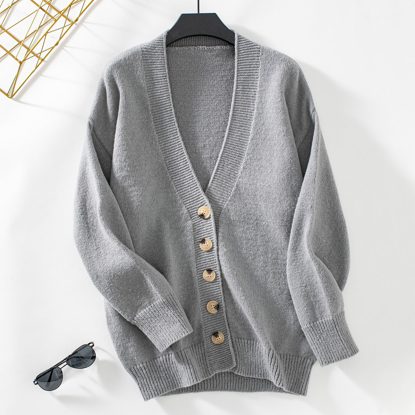 Damen gemütliche Strickjacke mit Knopfdetails und tiefem V-Ausschnitt