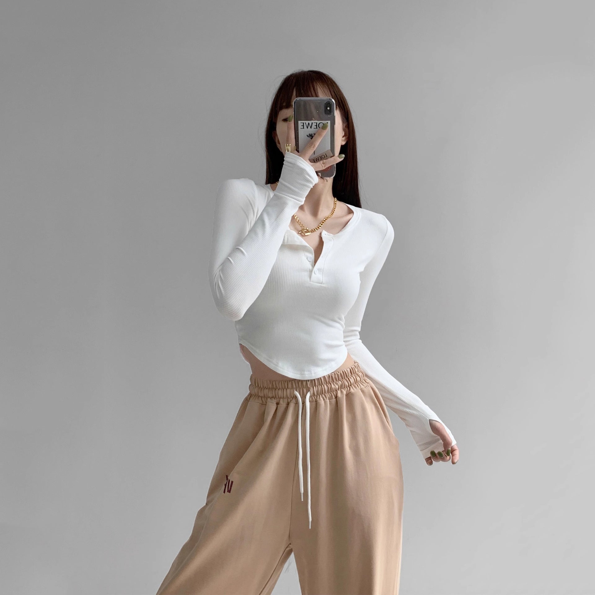 Damen Langarmshirt mit dekorativem Knopfdesign und lässigem Schnitt