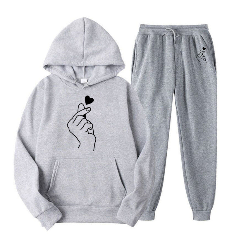 Damen Jogginganzug mit kreativem Herzmotiv und bequemer Passform