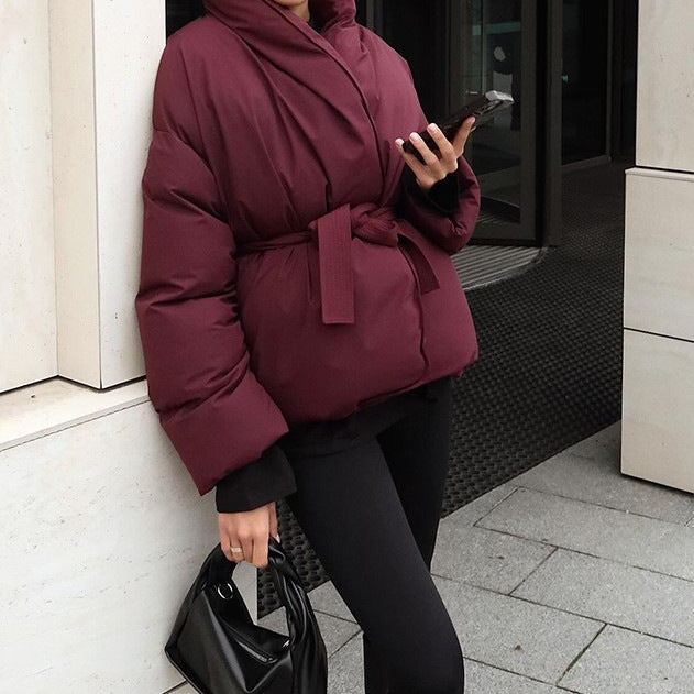 Damen Oversized Steppjacke mit Gürtel und hohem Kragen
