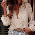 Damen Bluse mit feinen Spitzendetails und floralen Mustern