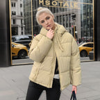 Damen modische Pufferjacke mit verstellbarer Kapuze und dicken Isolierungen
