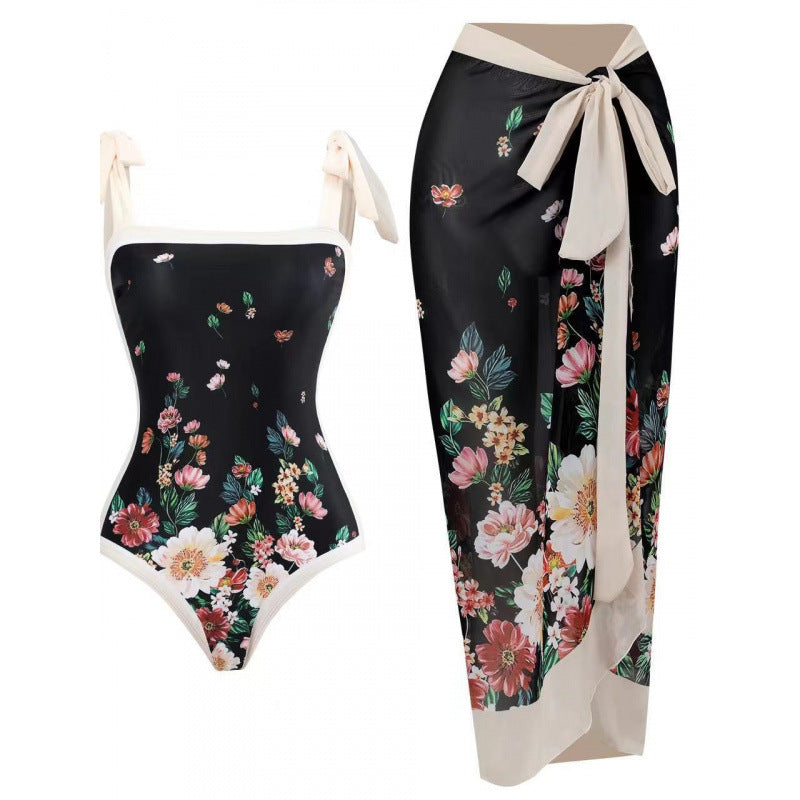 Damen Einteiliger Badeanzug mit stilvollem Wickelrock und modischem Muster R&B