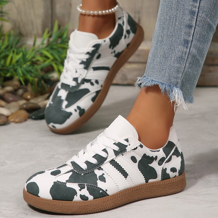 Damen Sportliche Sneakers mit trendigem Kuhdesign R&B