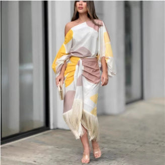 Damen Wickelkleid mit asymmetrischem Schnitt und fransenbesetztem Saum Heidi-Mode