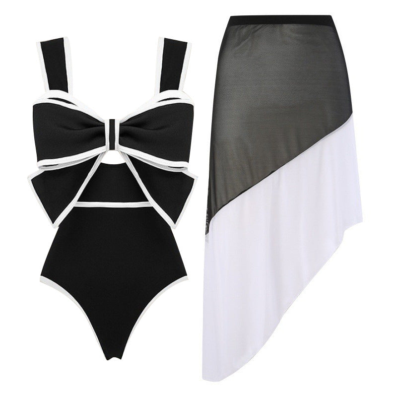 Damen Badeanzug mit modischem Bogen-Design und dazu passendem Rock R&B